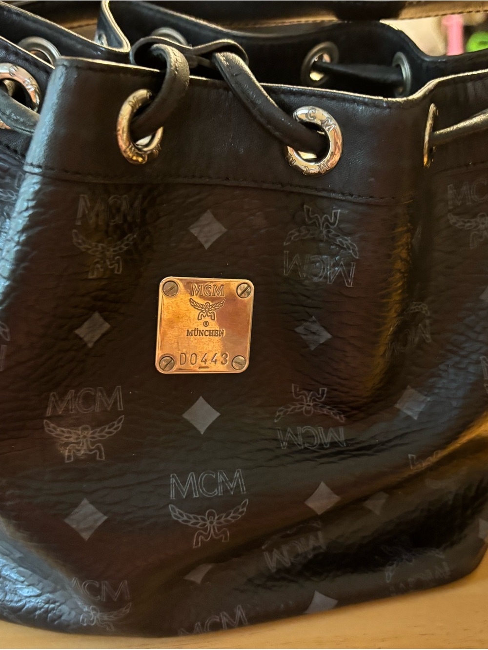 MCM Black Monogram Drawstring Bucket Bag with Gold Plaque